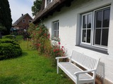 Ferienhaus in Högsdorf - Alte Reetdach-Poststation 1857 - Straßenseite